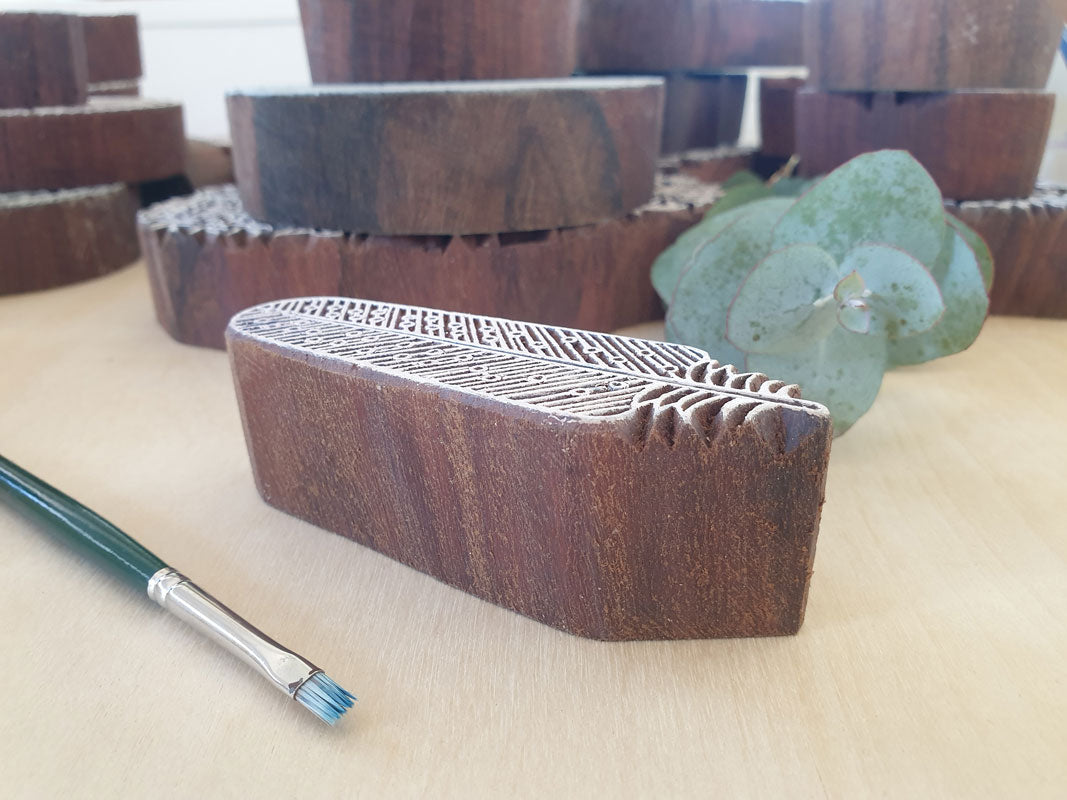 Feather wood stamp.