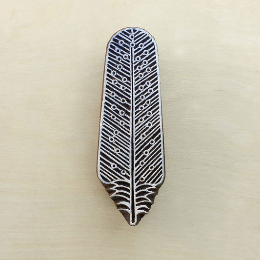 Feather stamp, wood block stamps.